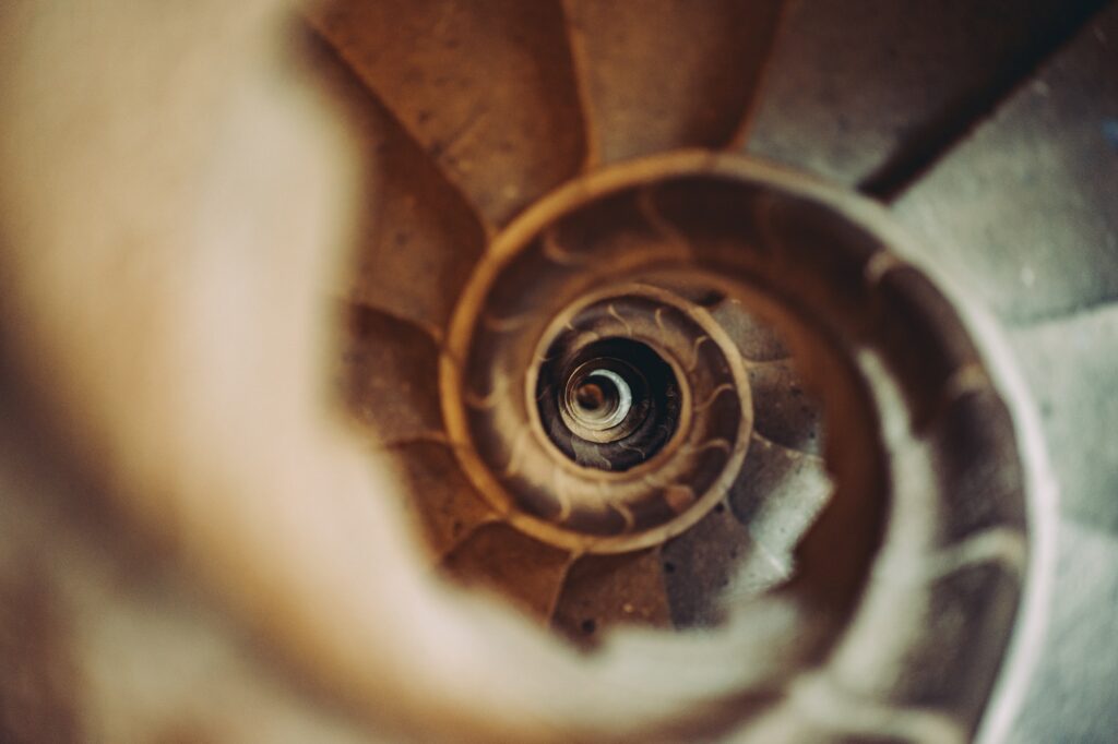 Spiral stone stairs going down. Barcelona